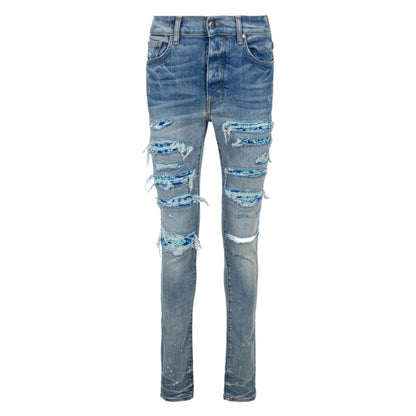Amiri  Brand Embossed Ripped Blue Jeans